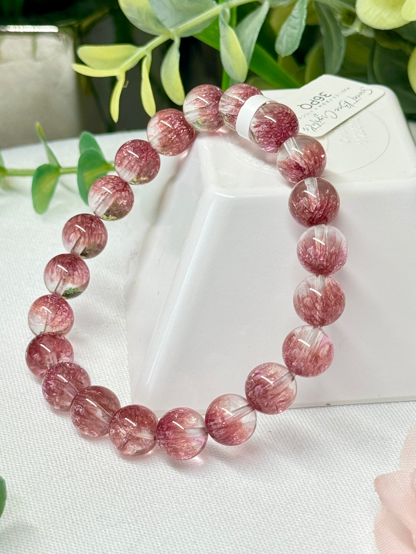 Plum colored quenched quartz bracelet. 9mm beads and fits wrist size 7”. Can be resized. *color enhanced