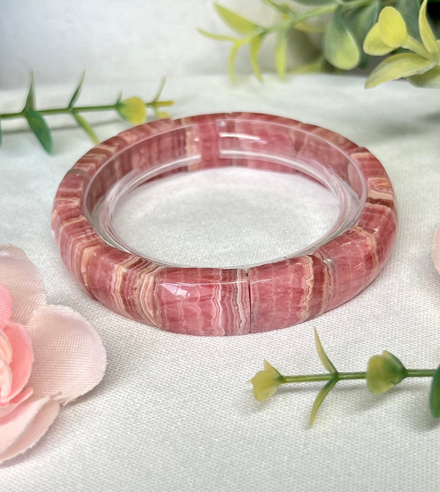 HQ rhodochrosite soft Bengal. See all photos for detailed view of each bead. Beads measure 12.5mm and fits a wrist size 7”*