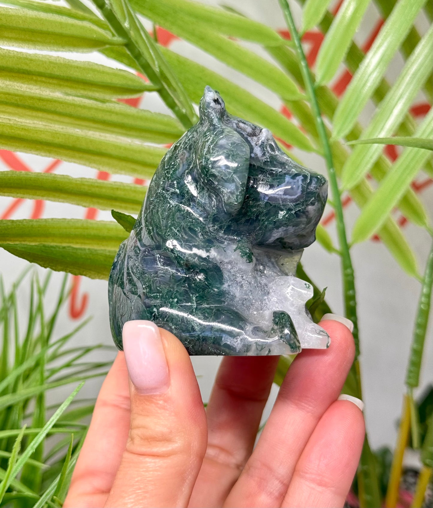 Moss agate sitting cow carving. Measures 3.25” tall and 2.5” wide