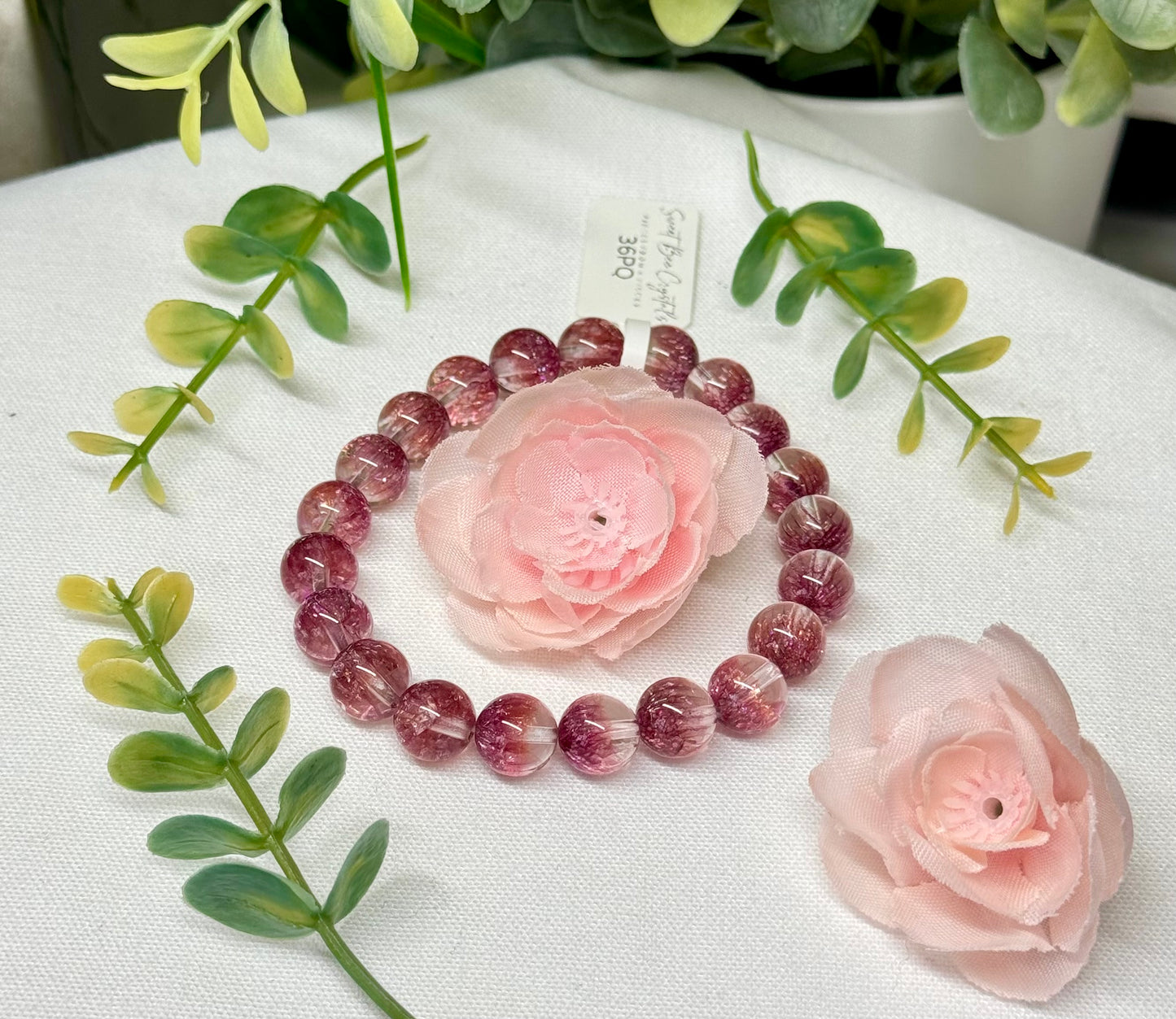 Plum colored quenched quartz bracelet. 9mm beads and fits wrist size 7”. Can be resized. *color enhanced