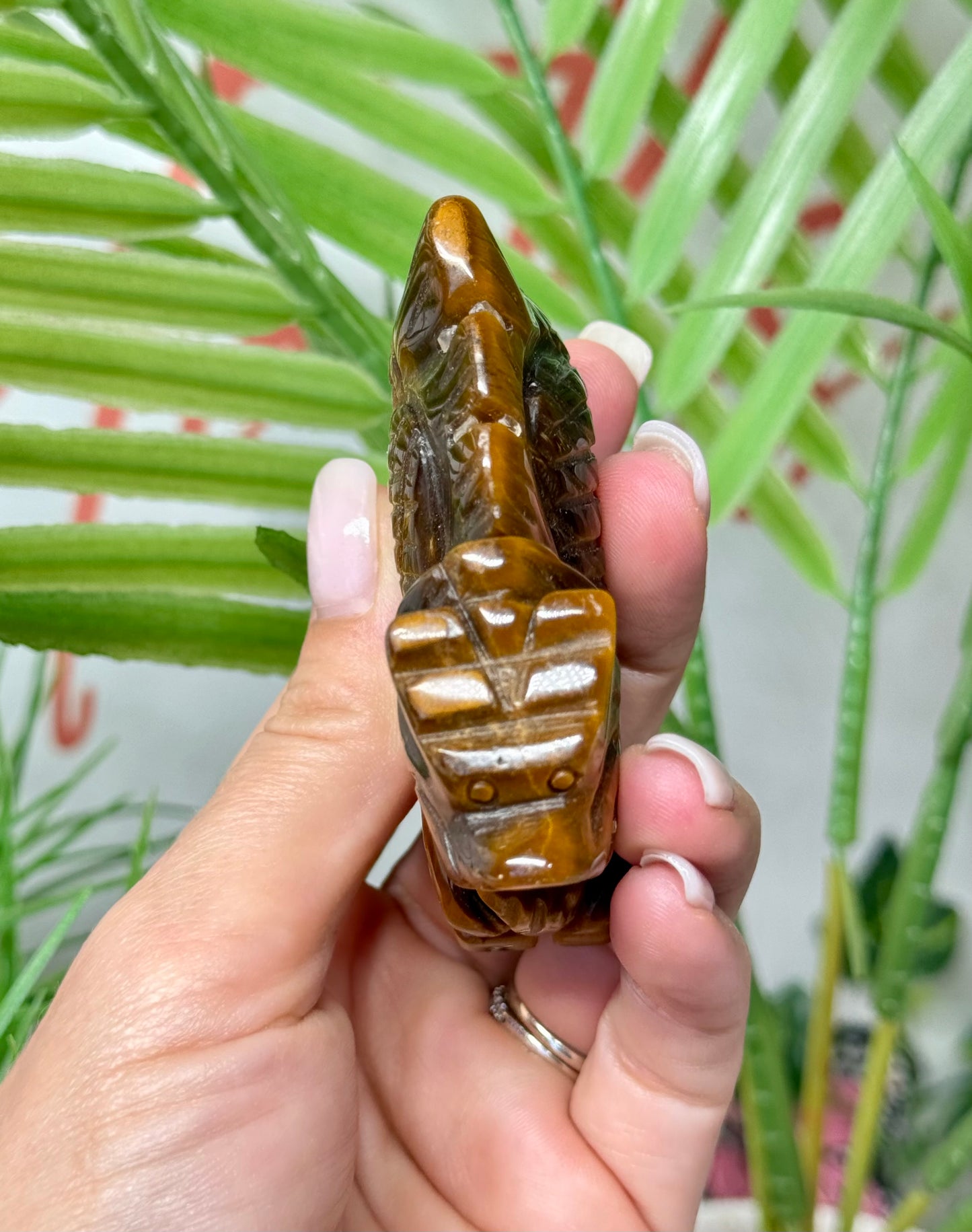 Tigers eye Chinese dragon carving. Measures 3” wide and 2” tall