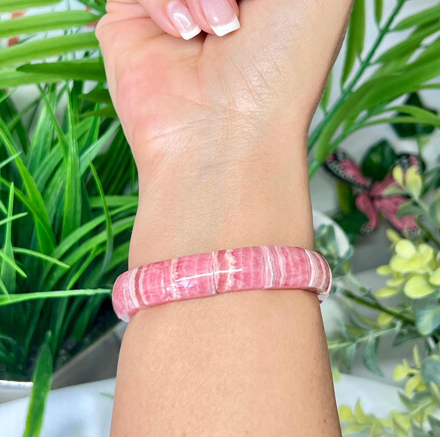 HQ rhodochrosite soft Bengal. See all photos for detailed view of each bead. Beads measure 12.5mm and fits a wrist size 7”*