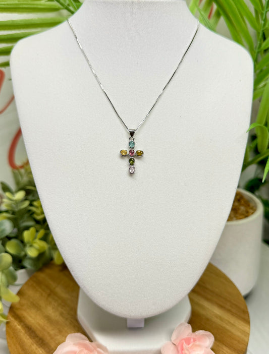 Rainbow tourmaline cross necklace. S925 plated copper with 18” and under adjustable chain