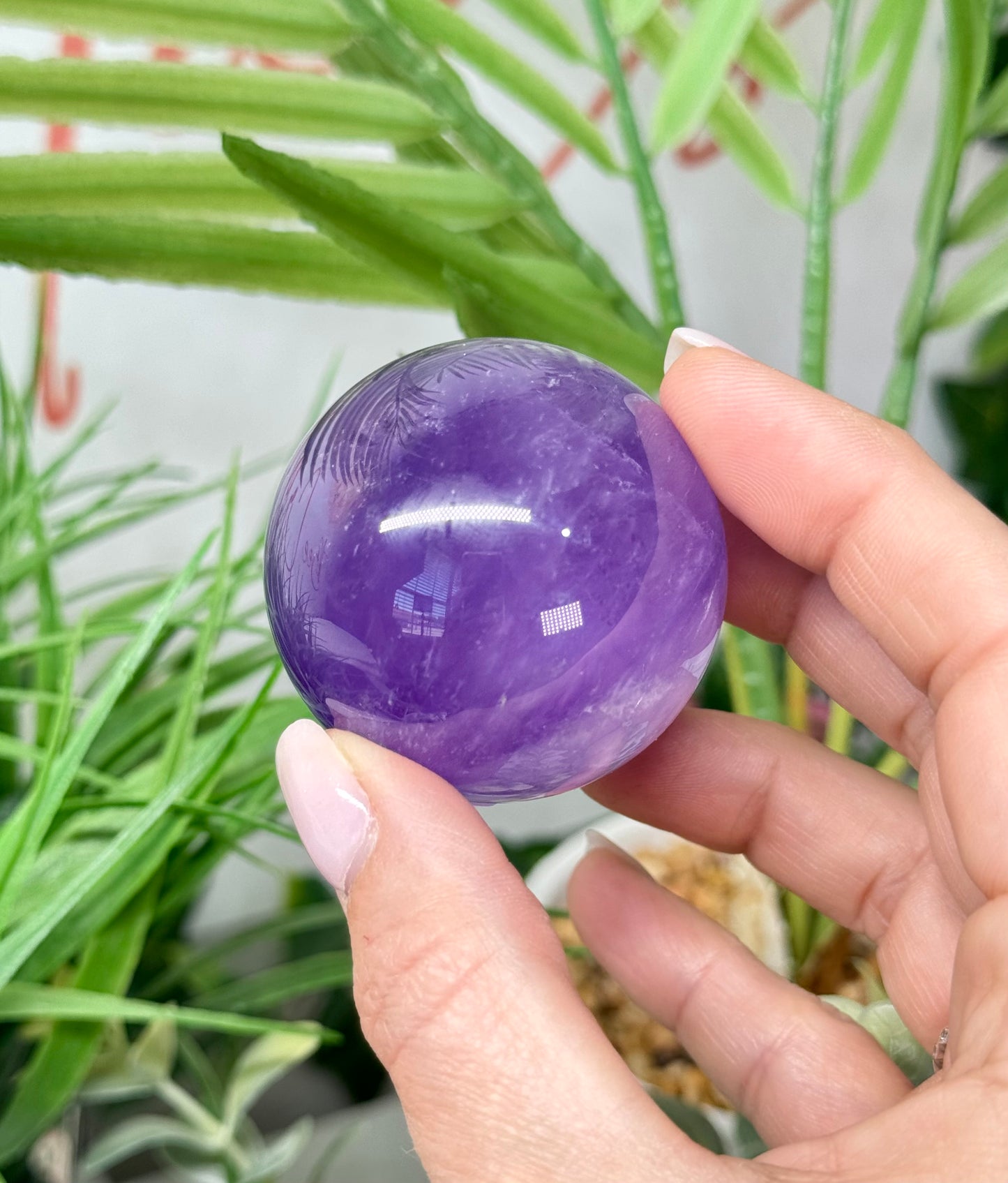 Beautiful amethyst sphere. 46.5mm and will include a sphere stand. *see attached photos for back lighting