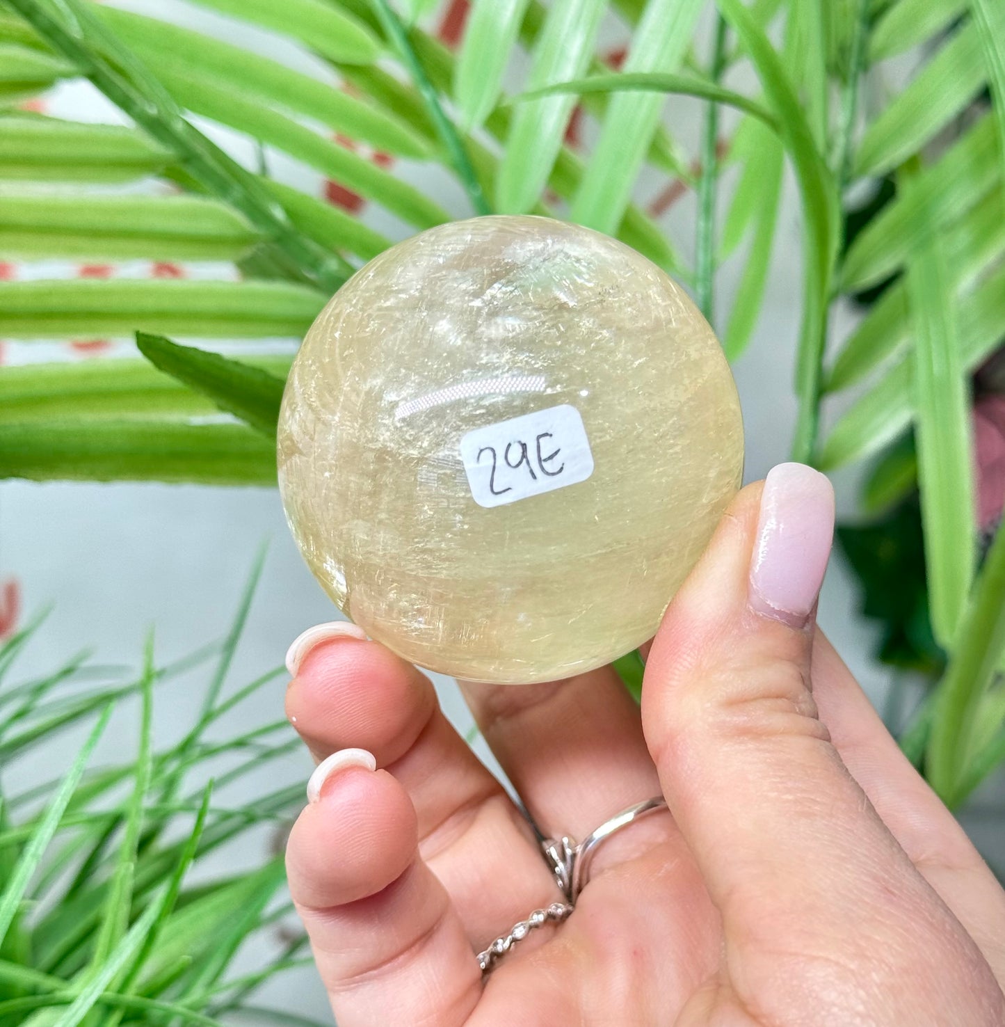 Honey calcite sphere. 52.5mm will include a sphere stand