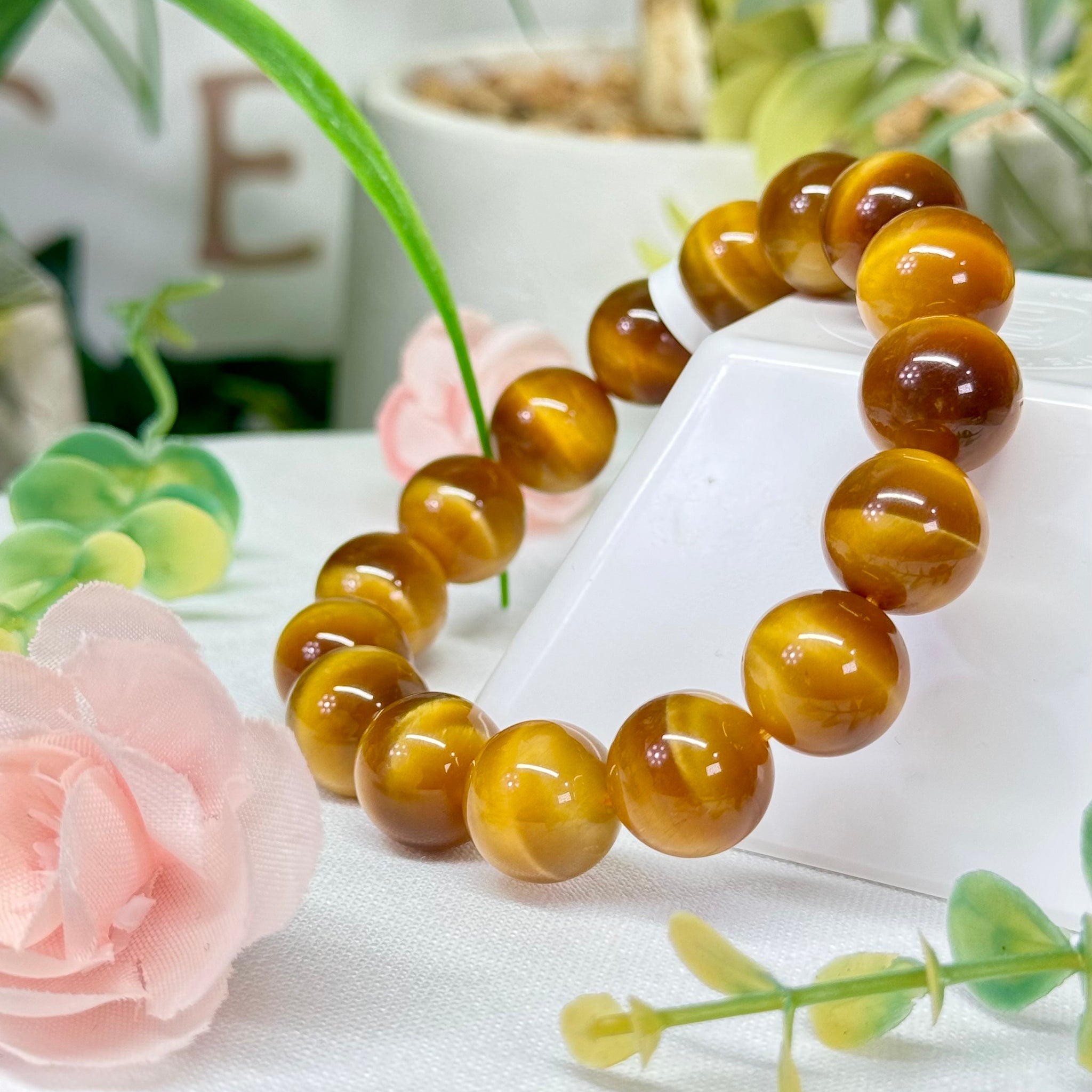 Golden blonde tigers eye bracelet. 12.5mm beads and fits wrist size 7.25”