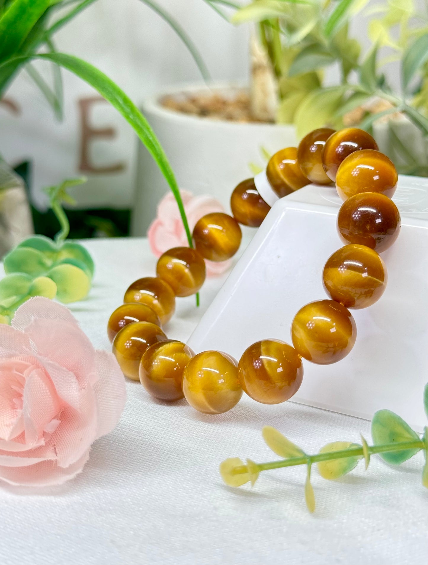 Golden blonde tigers eye bracelet. 12.5mm beads and fits wrist size 7.25”