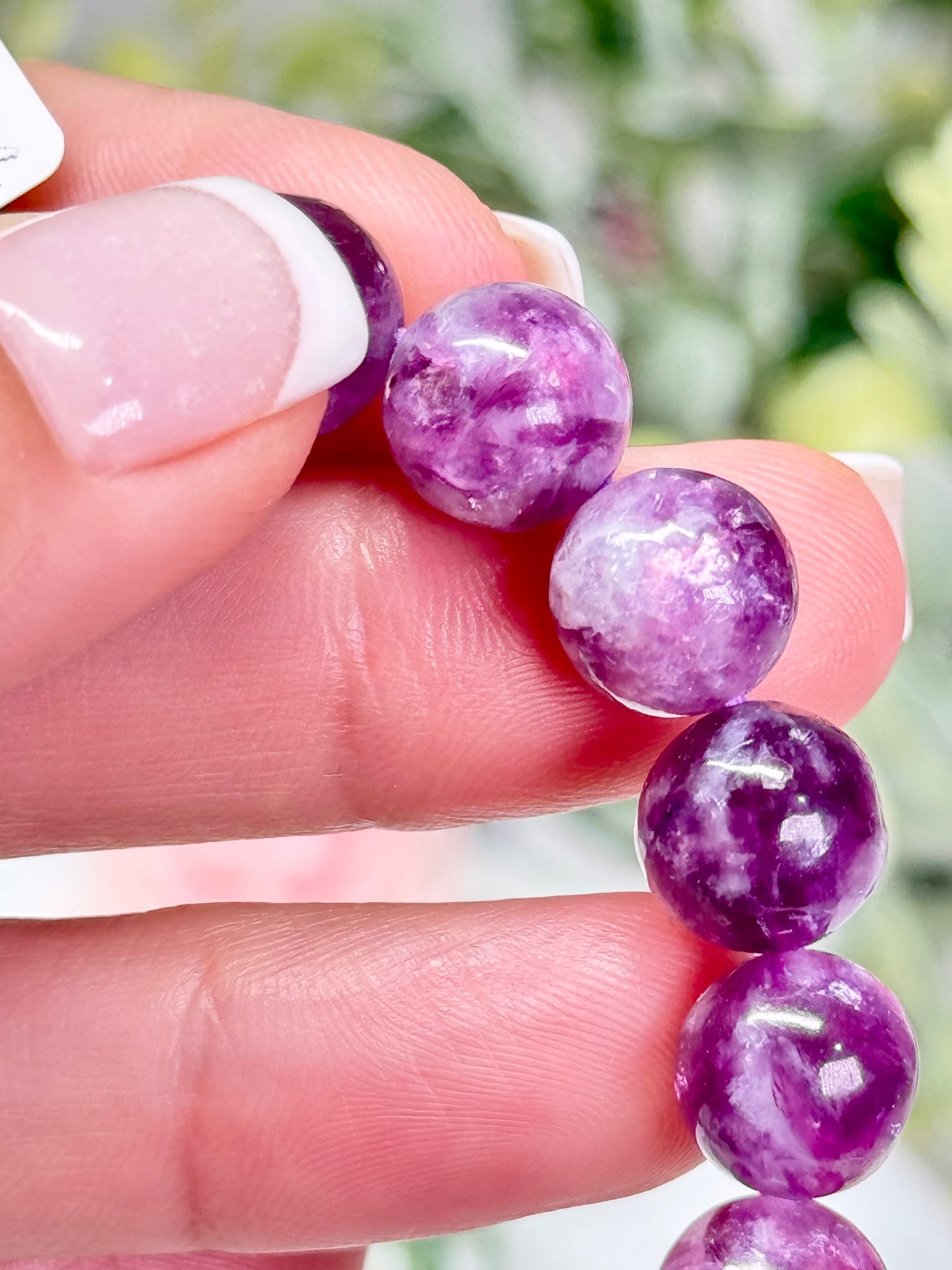 Purple Muscovite bracelet. 10.2 mm beads and fits a size 7” wrist. See photos for details.