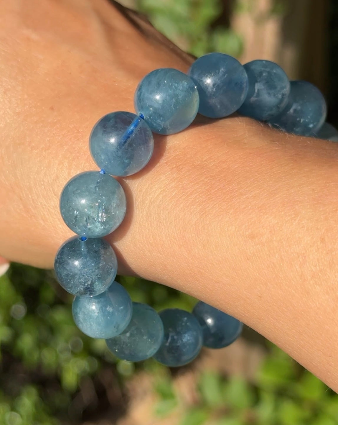 HQ aquamarine bracelet. With asterisms and chatoyancy. Deep blue color and fabulous! Please see all pics for details. 13.6mm beads and fits wrist size 7” can be downsized