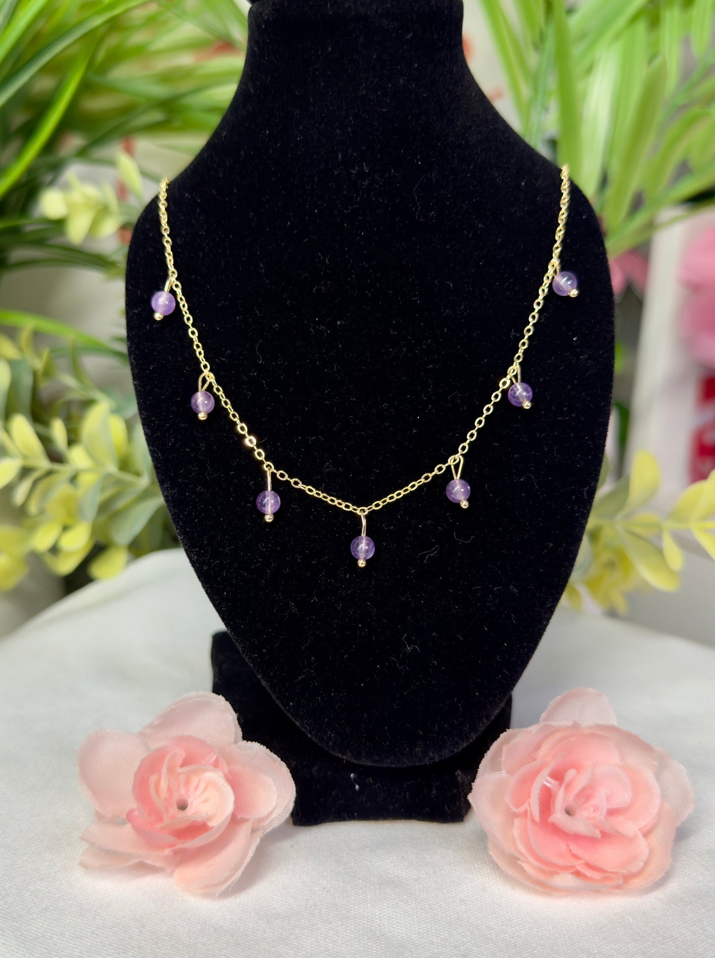 Dainty amethyst necklace with drop beads. Gold plated copper and fits size 16.5”-18.5” with clasp closure