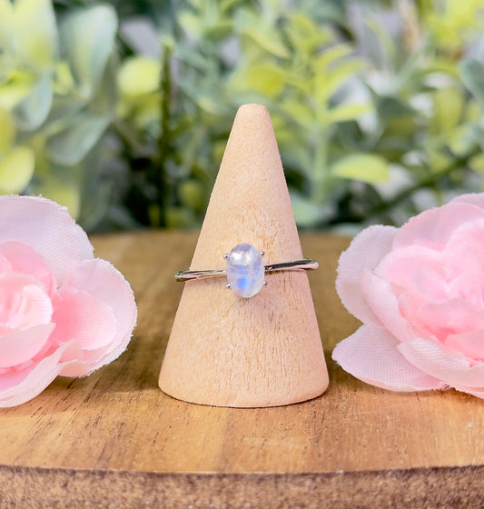 Silver or gold simple moonstone ring. Size is adjustable.