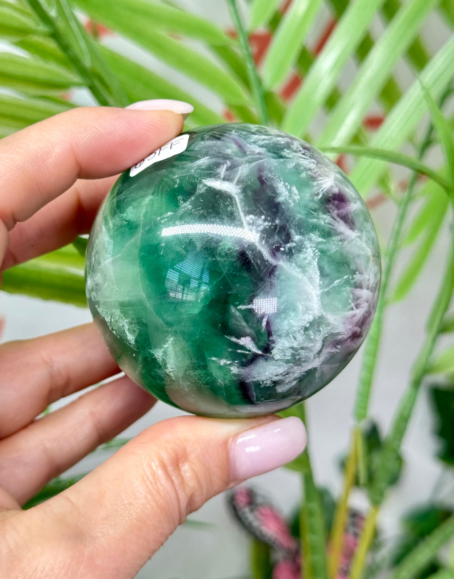 Large feather fluorite sphere. 60mm and will include a sphere stand. *see attached photos for back lighting