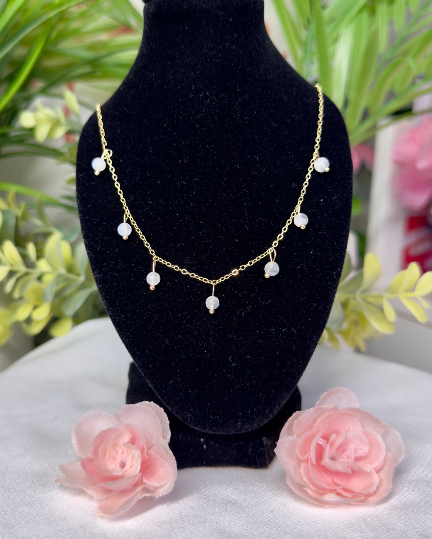 Dainty moonstone necklace with drop beads. Gold plated copper and fits size 16.5”-18.5” with clasp closure