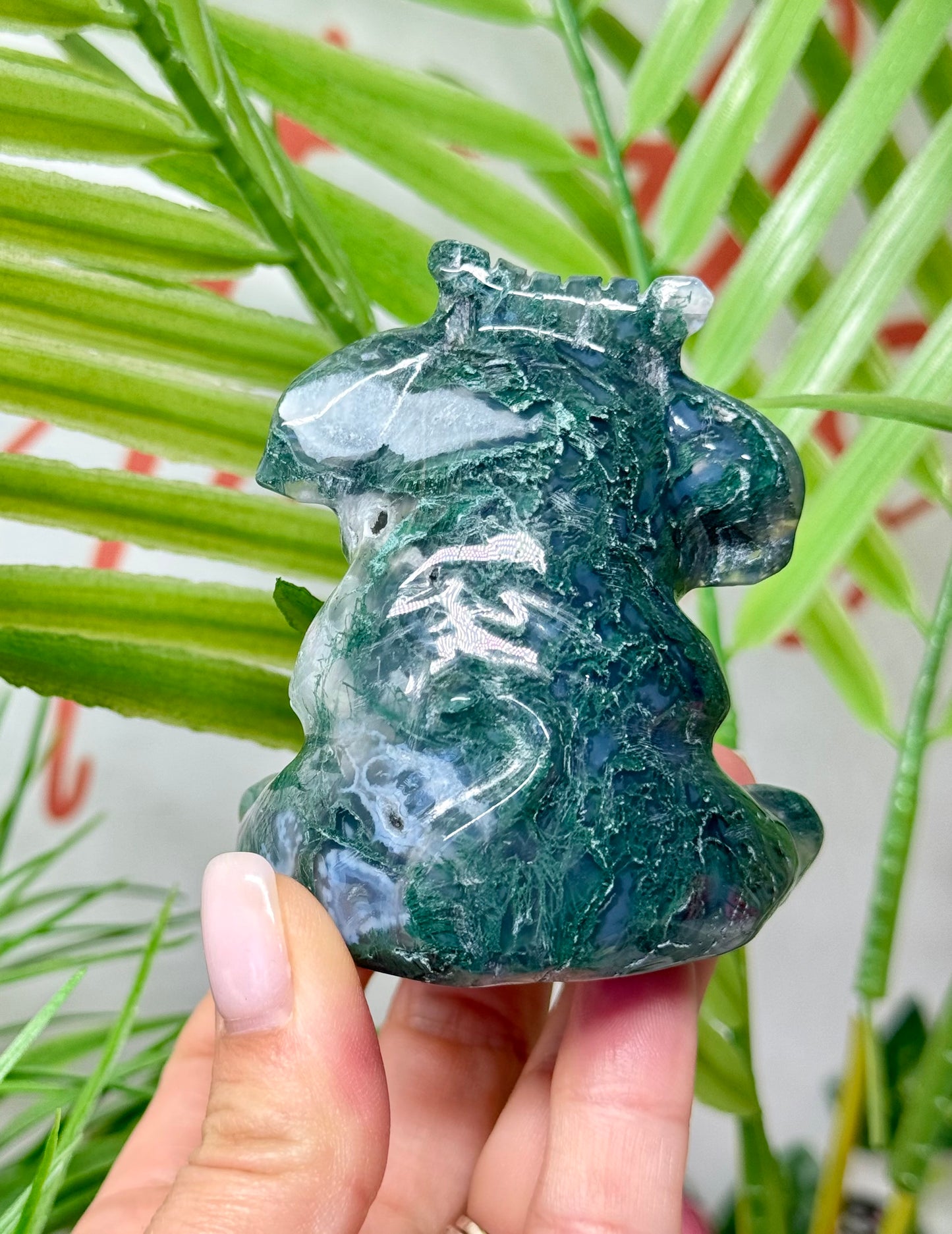 Moss agate sitting cow carving. Measures 3.25” tall and 2.5” wide