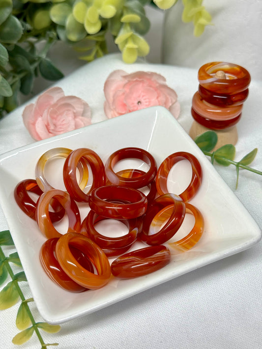 Carnelian band ring. Mixed sizes 7-9. Can also be used as a sphere holder