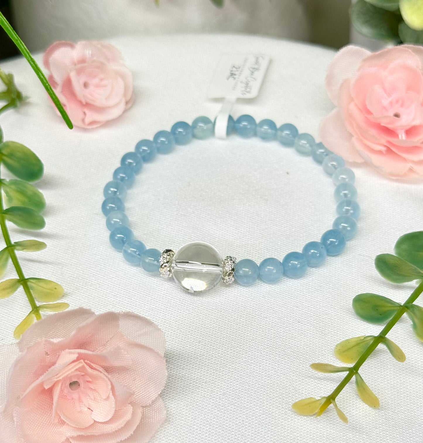 Aquamarine and clear quartz design bracelet. 7mm/12mm beads and first wrist size 7”