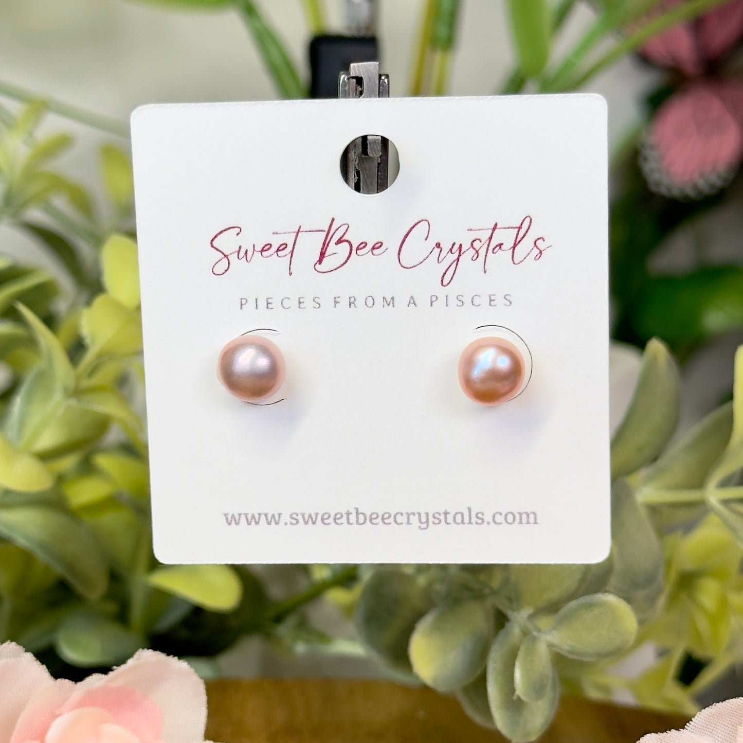 Purple toned freshwater pearl stud earrings with silicon backs. S925 plated stainless steel