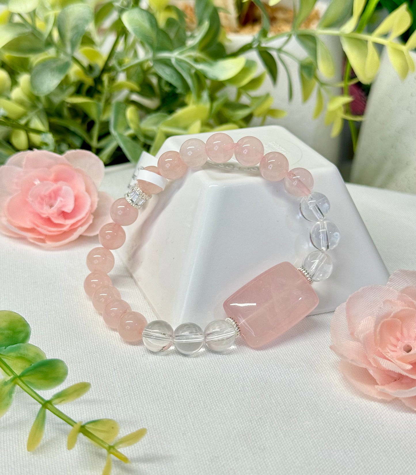 Clear Quartz bracelet with large rose quartz bead. 8mm/18mm. Size 7” and adjustable